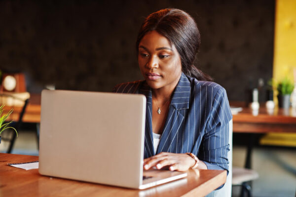 Home 15 girl working with laptop e1739818576460
